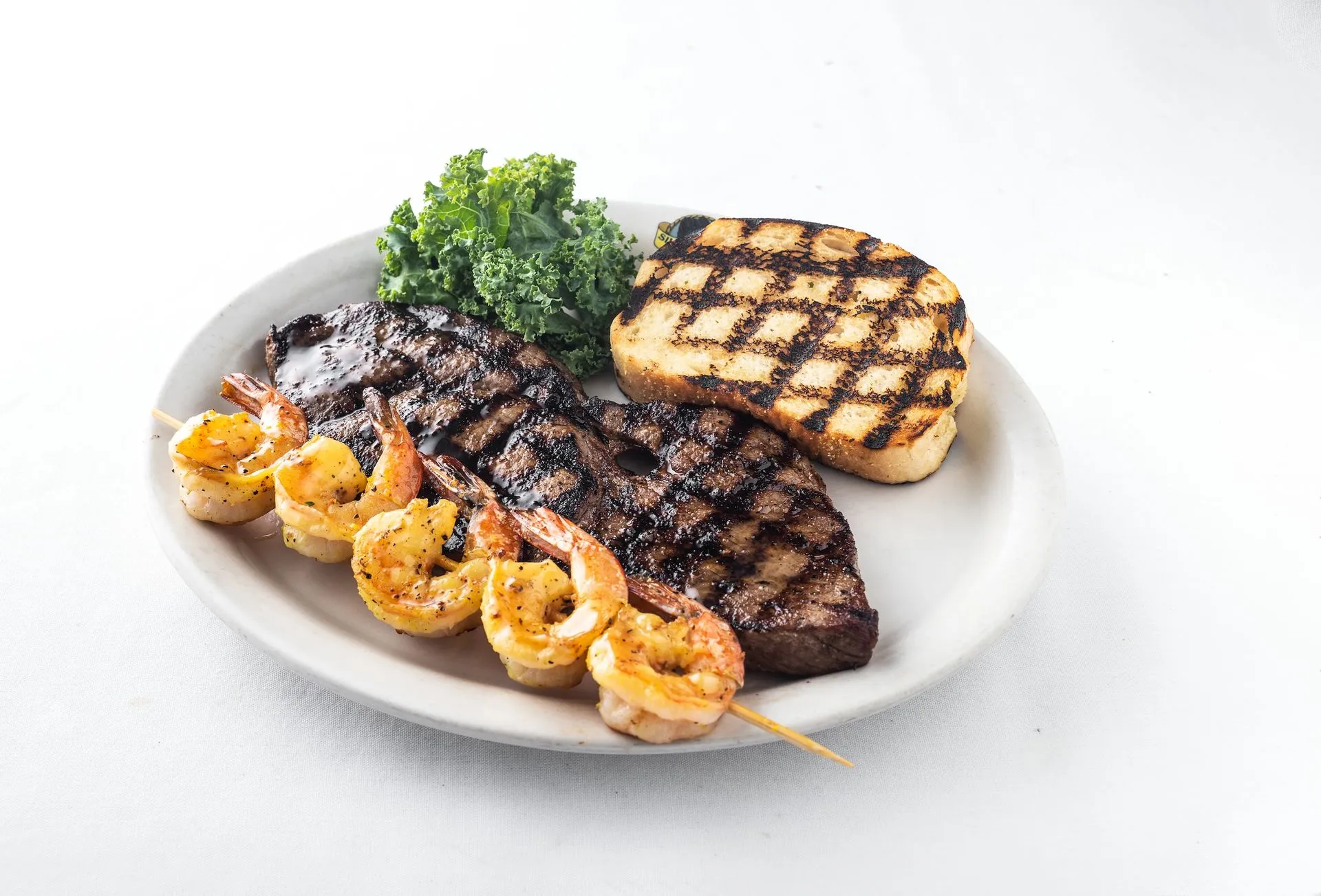 Sirloin steak and grilled shrimp meal at Blue Ocean Seafood