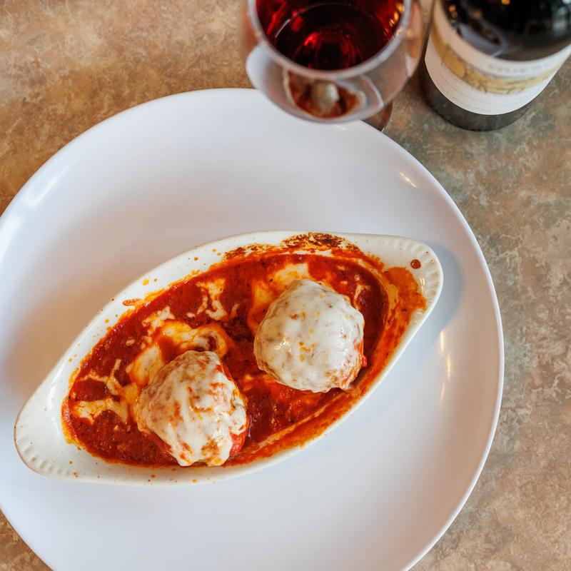 Italian meatballs with marinara and melted cheese served at Ferrando’s Italian Pizzeria