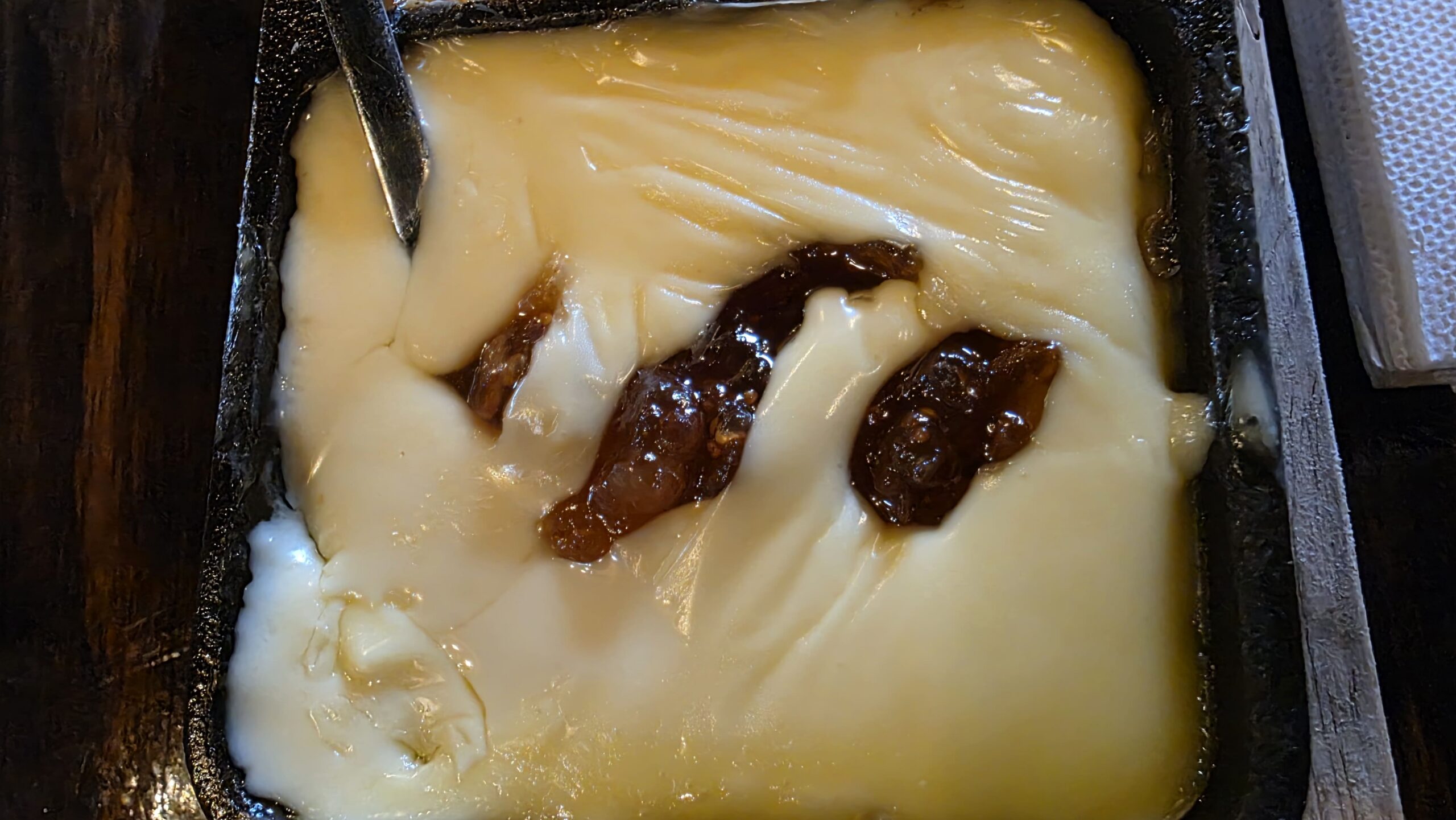 Baked brie with fig jam from the cheese and dip trio at Lanky's on Laurens